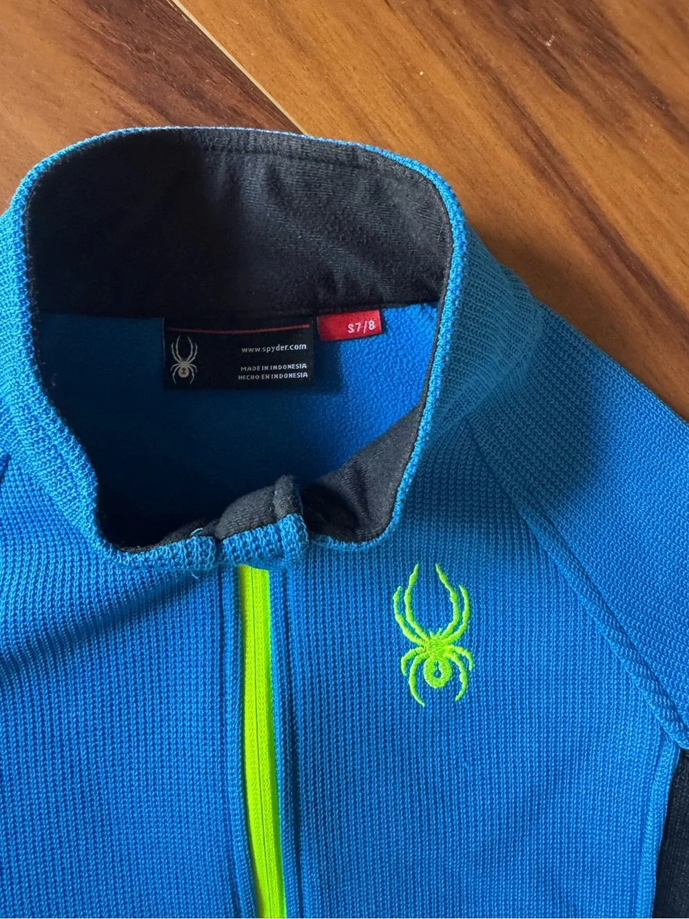 Spyder Kids Royal Blue and Black zip sweater with Neon Logo